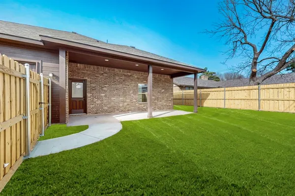 a view of a porch with a backyard