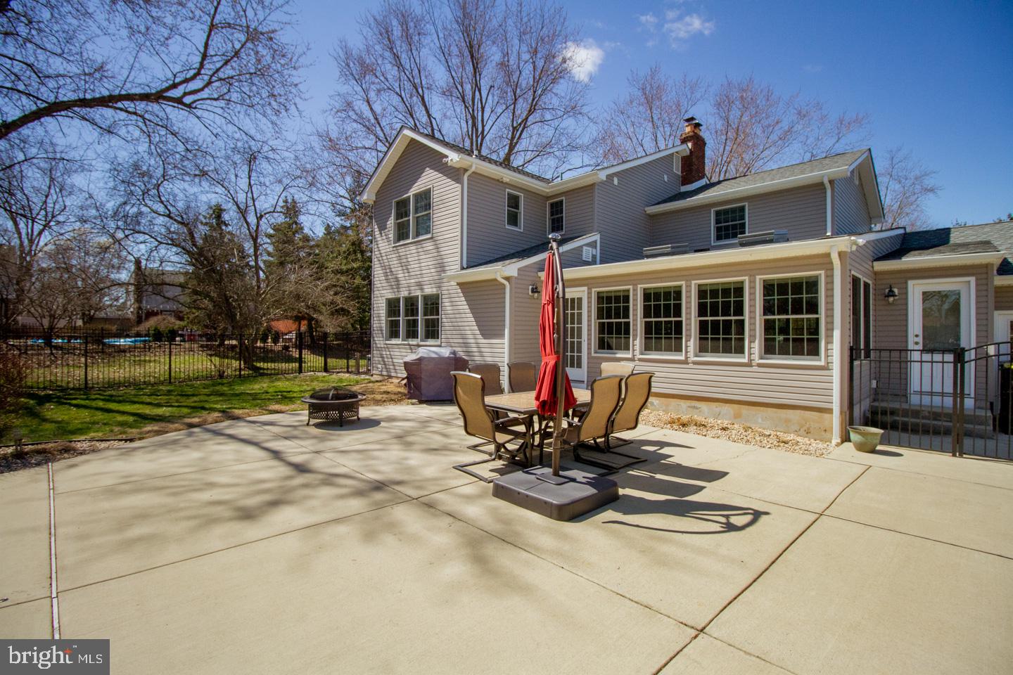 278 Pebble Ridge Road Warrington, PA 18976 - Photo 29 of 33 Rear of house with extensive patio & pool decking