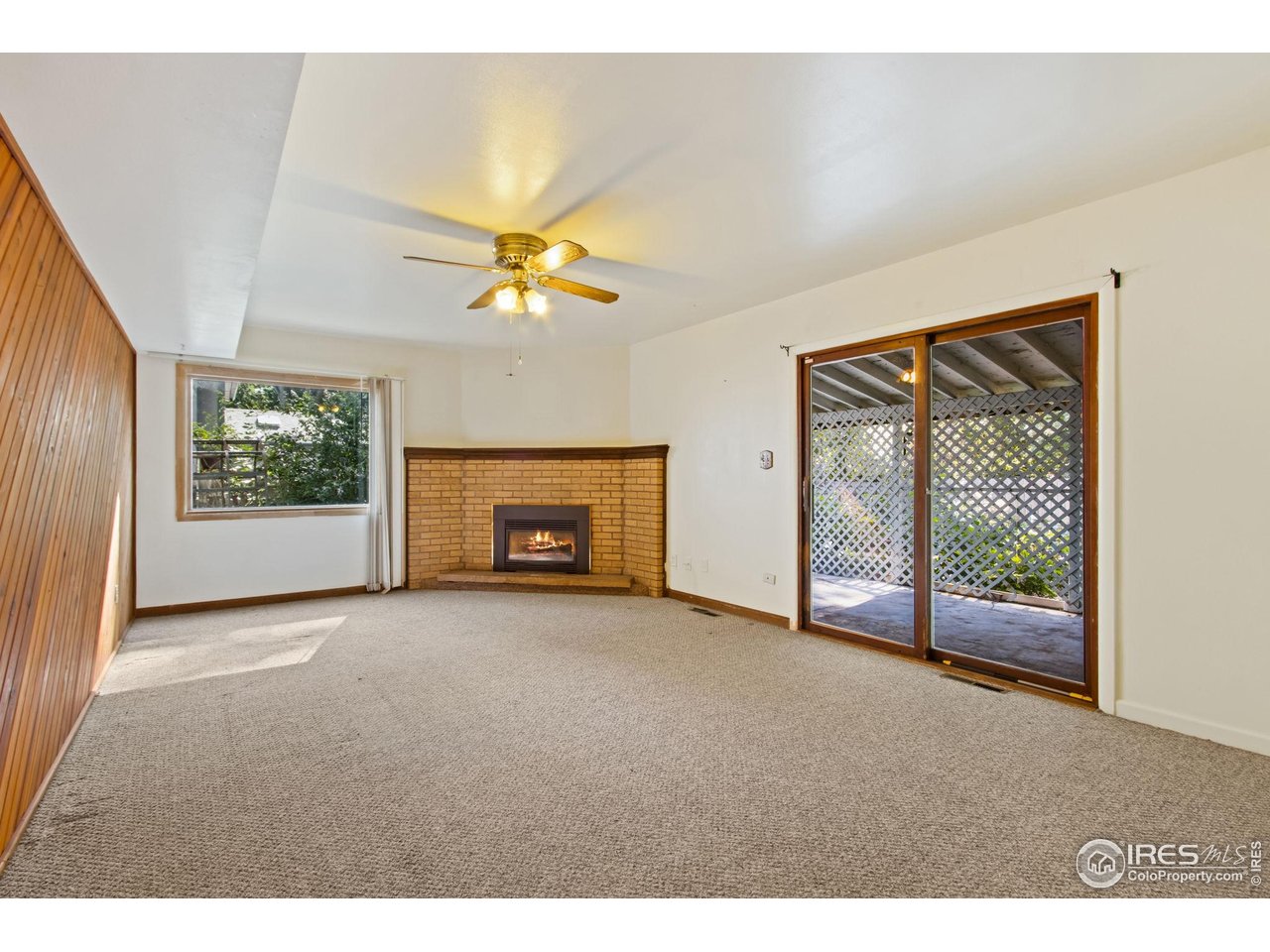 431 West Swallow Road Fort Collins, CO 80526 - Photo 10 of 26 Family Room with Gas Fireplace (converted from wood burning)-Main Level