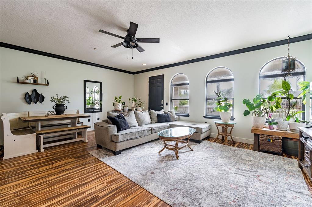 2204 1st Street, Unit F Indian Rocks Beach, FL 33785 - Photo 5 of 37 a living room with furniture and a window