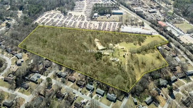 a view of swimming pool from a balcony