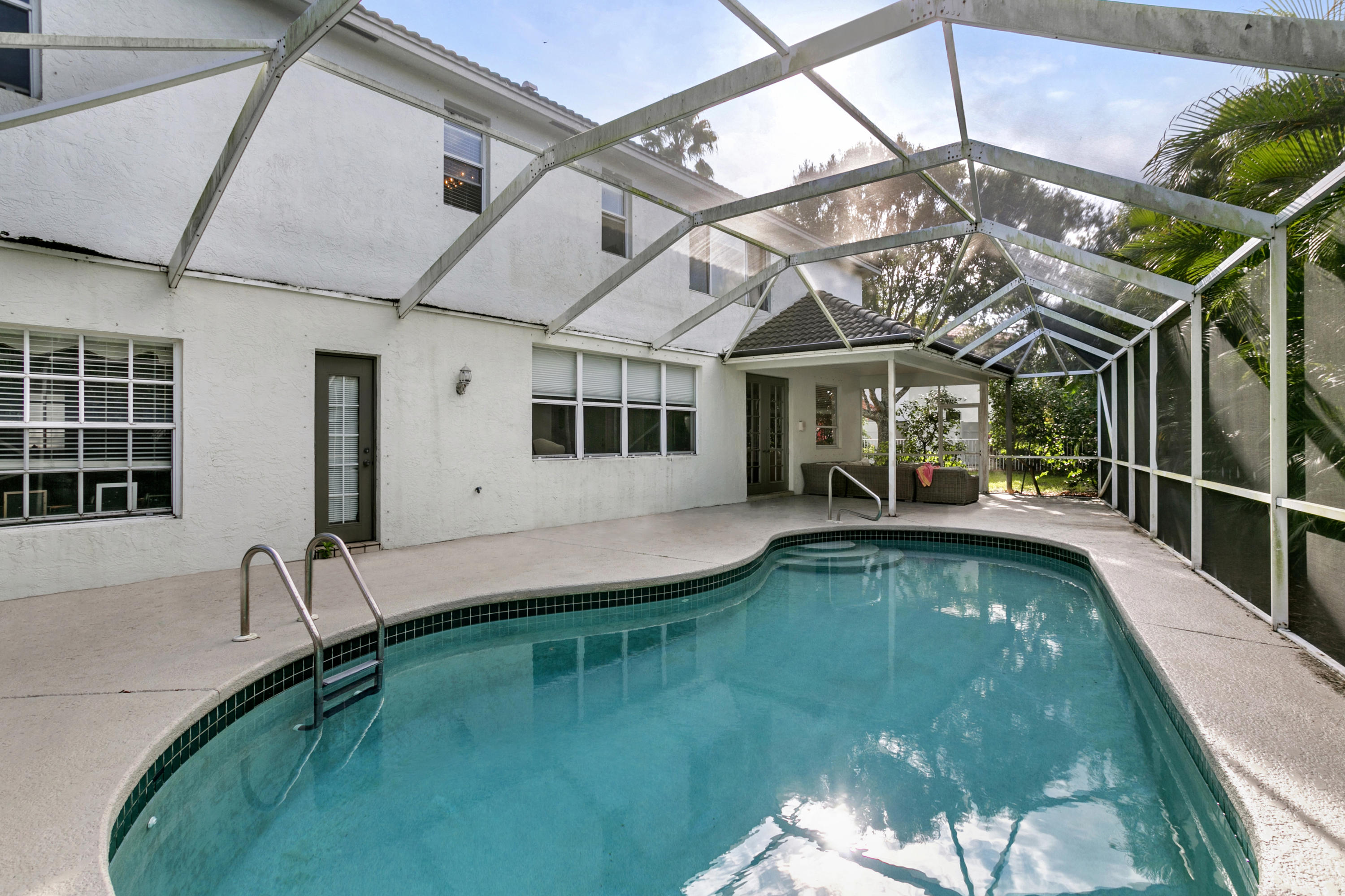 204 Seagull Point Jupiter, FL 33458 - Photo 15 of 18 a view of a house with pool