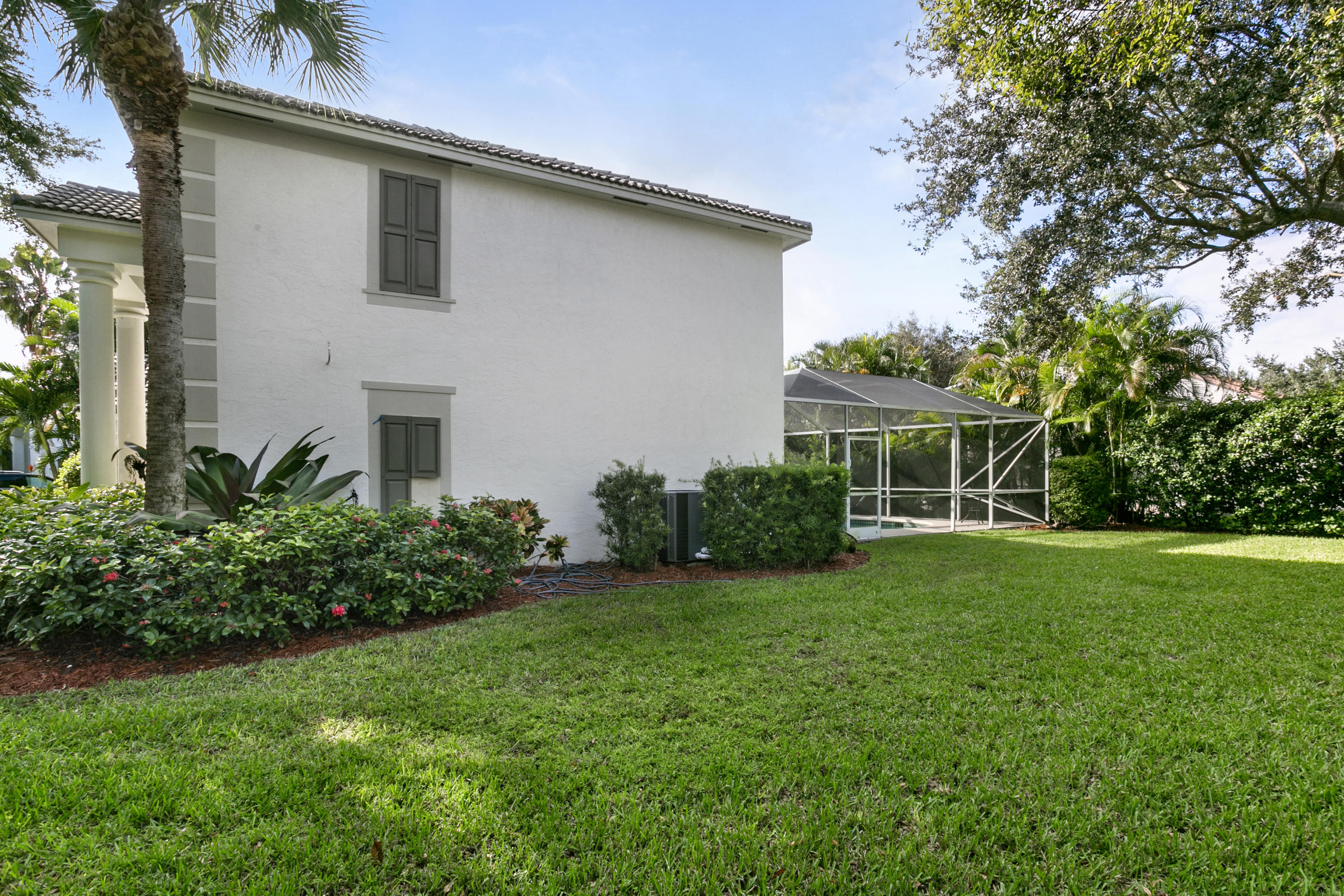 204 Seagull Point Jupiter, FL 33458 - Photo 18 of 18 a front view of a house with a yard