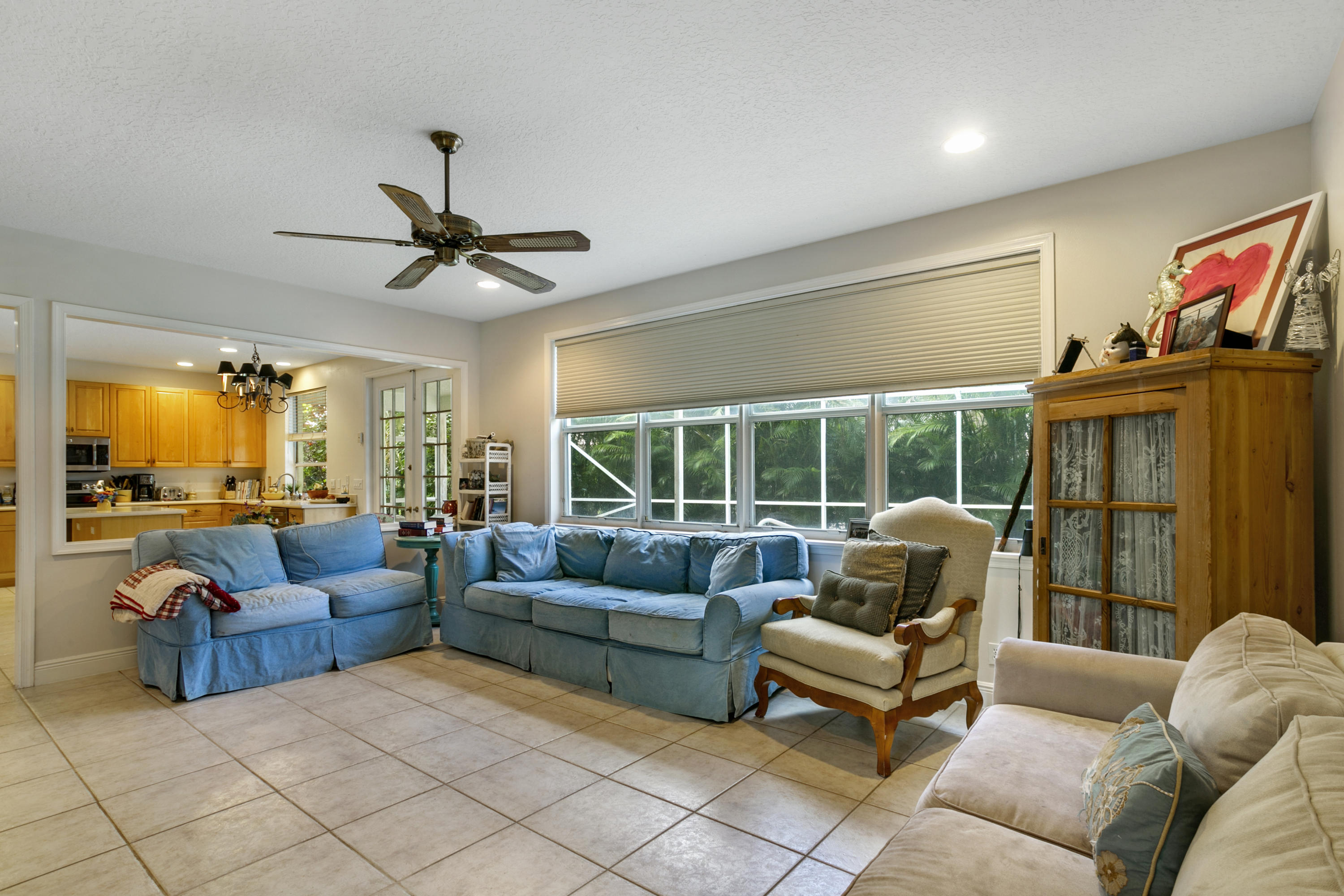 204 Seagull Point Jupiter, FL 33458 - Photo 5 of 18 a living room with furniture and a large window