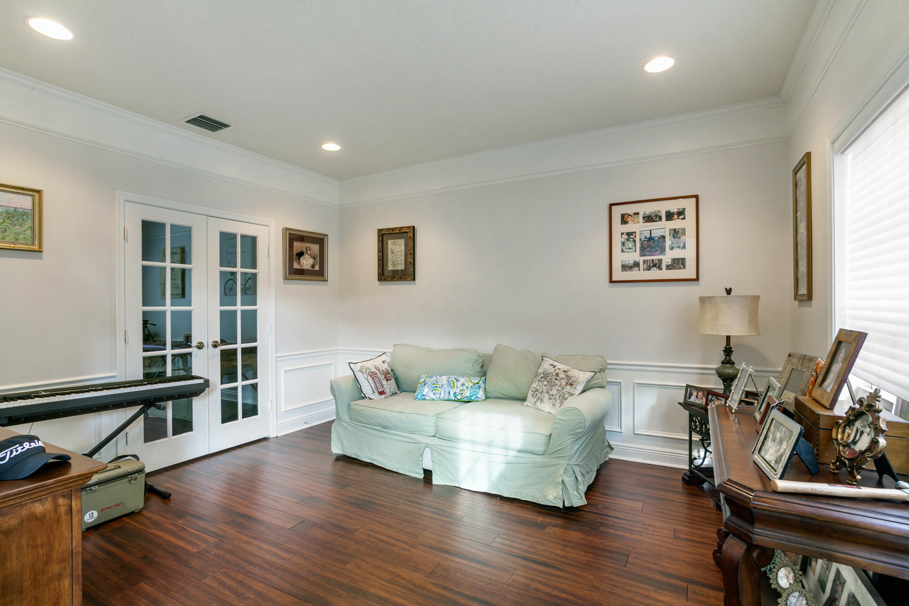 204 Seagull Point Jupiter, FL 33458 - Photo 7 of 18 a living room with furniture and a hard wood floor
