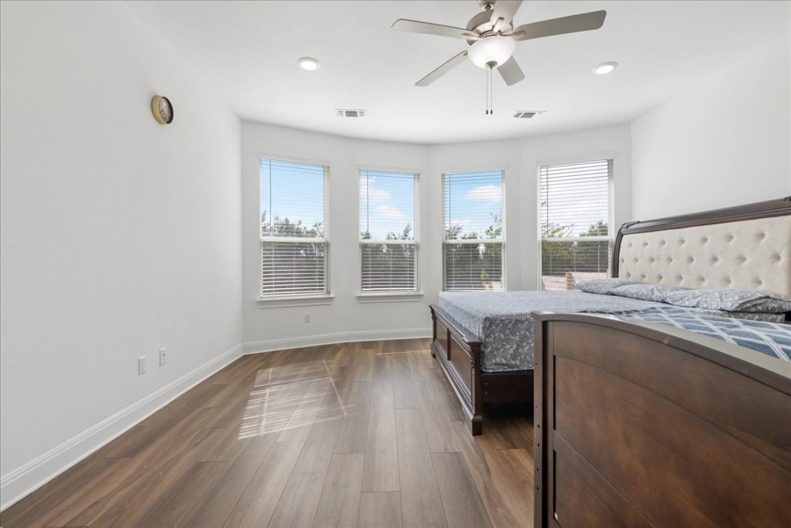 240 Inlet Lane Leander, TX 78641 - Photo 20 of 33 a kitchen with a sink and wooden floor