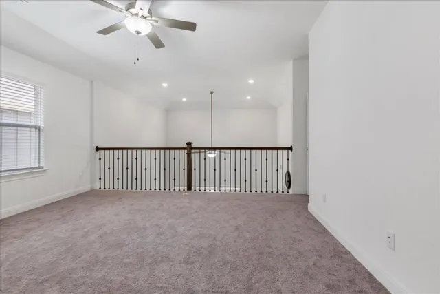 a view of a hallway with a chandelier