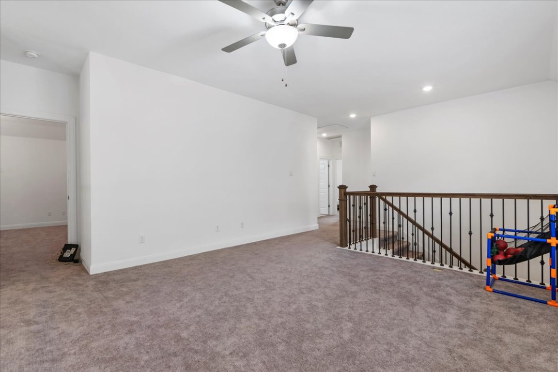 240 Inlet Lane Leander, TX 78641 - Photo 30 of 33 a view of a hallway with a chandelier