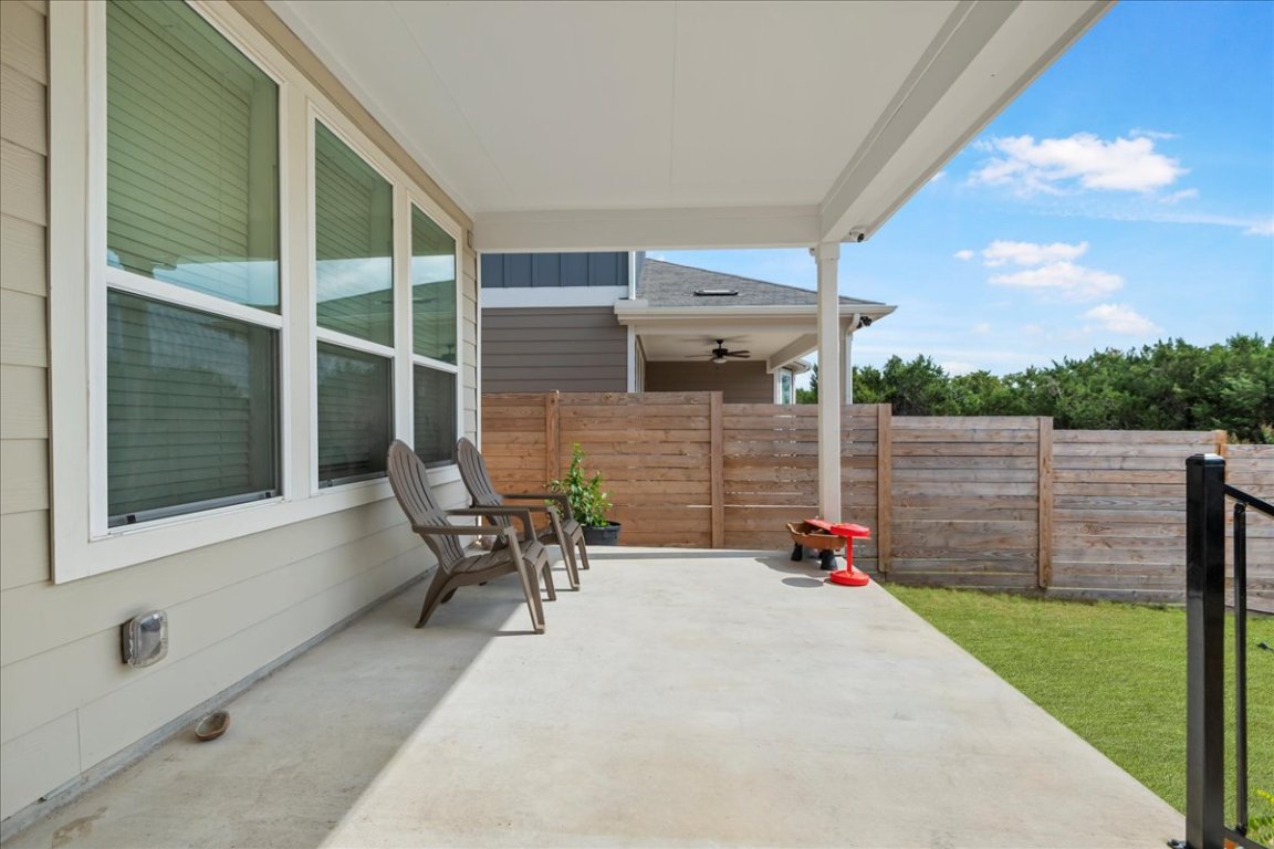 240 Inlet Lane Leander, TX 78641 - Photo 31 of 33 a backyard of a house with table and chairs