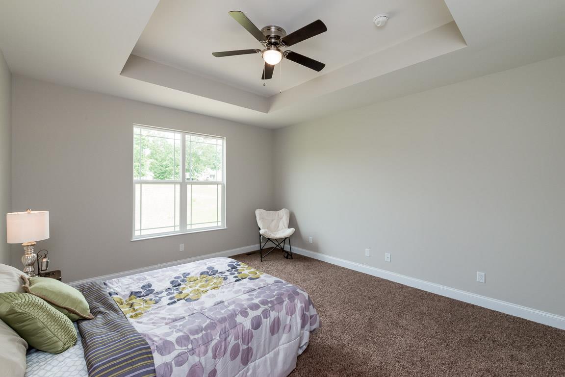 708 Ruby Way White Bluff, TN 37187 - Photo 20 of 30 a bedroom with a bed and a window
