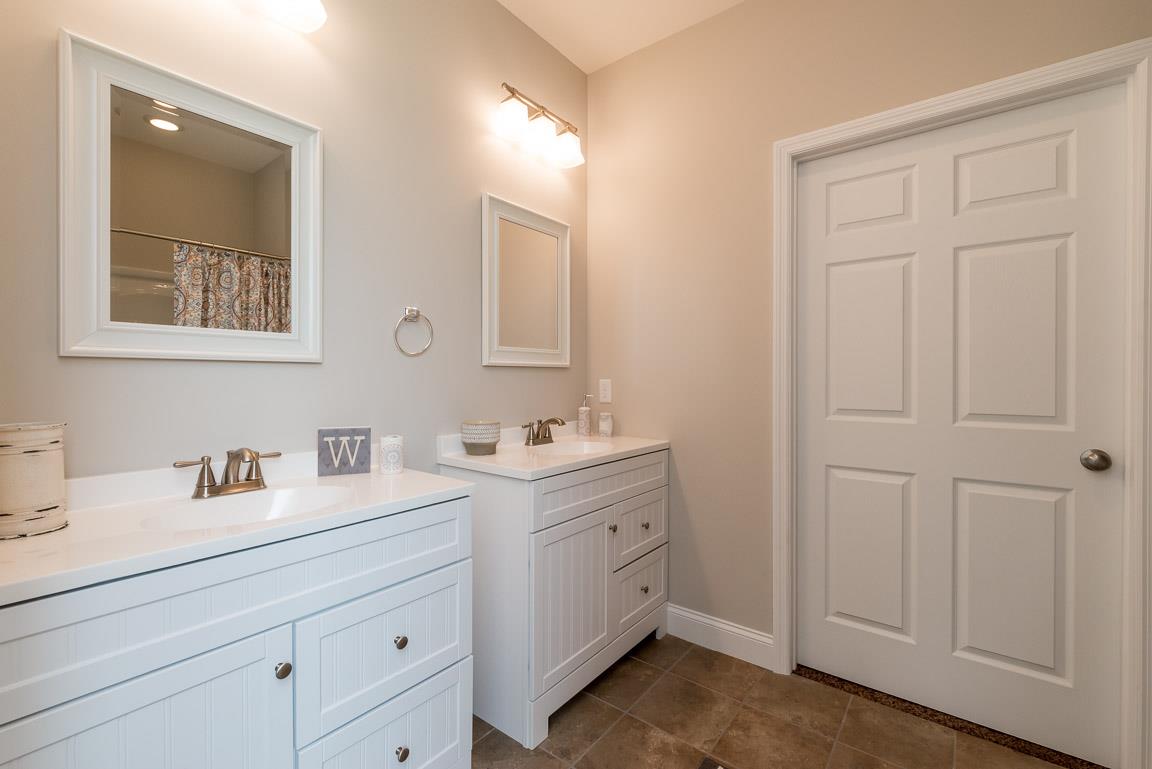 708 Ruby Way White Bluff, TN 37187 - Photo 23 of 30 a bathroom with 2 sink and a mirror
