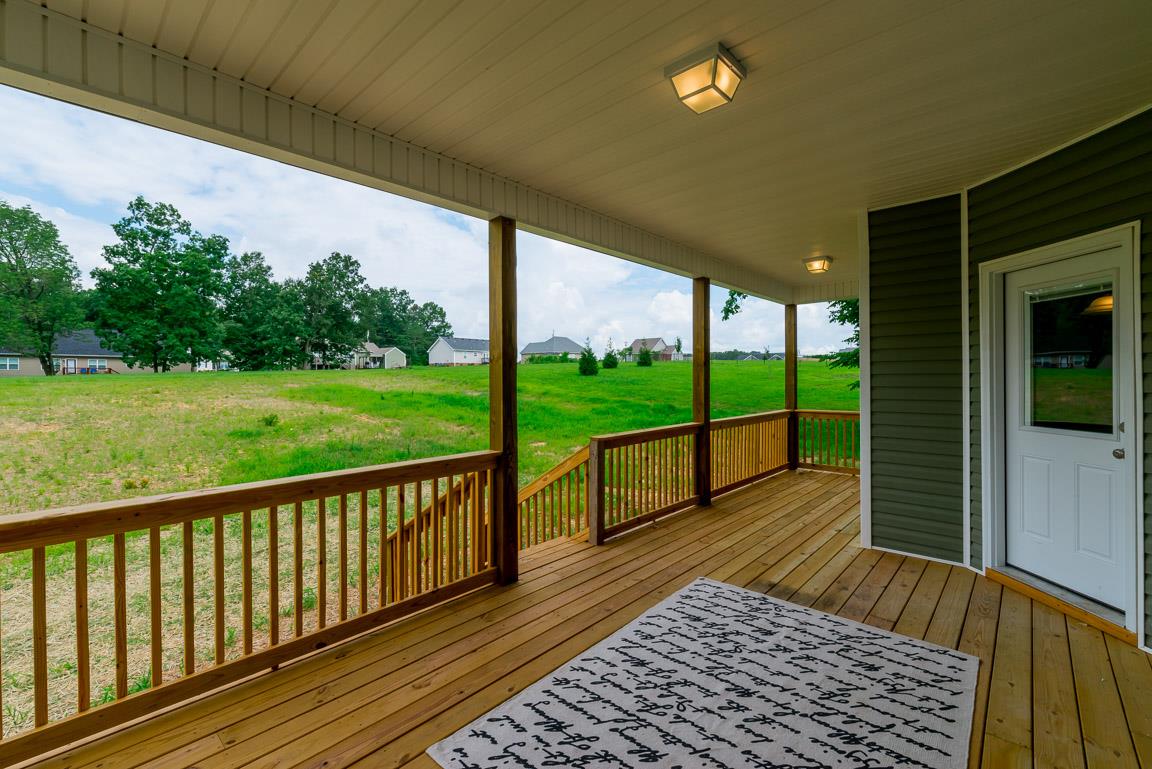 708 Ruby Way White Bluff, TN 37187 - Photo 3 of 30 a view of balcony with wooden floor