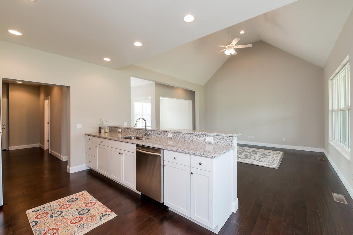 708 Ruby Way White Bluff, TN 37187 - Photo 5 of 30 a spacious bathroom with a granite countertop sink and a mirror
