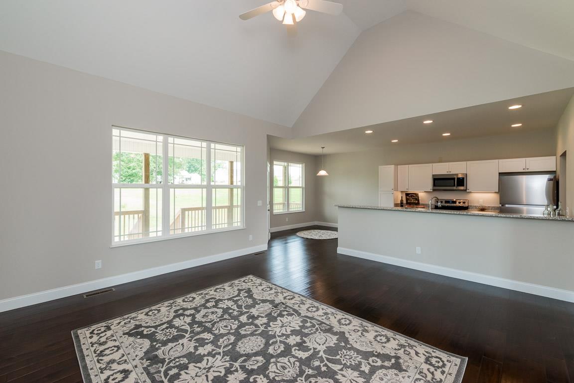 708 Ruby Way White Bluff, TN 37187 - Photo 10 of 30 a view of a kitchen with kitchen island and a window