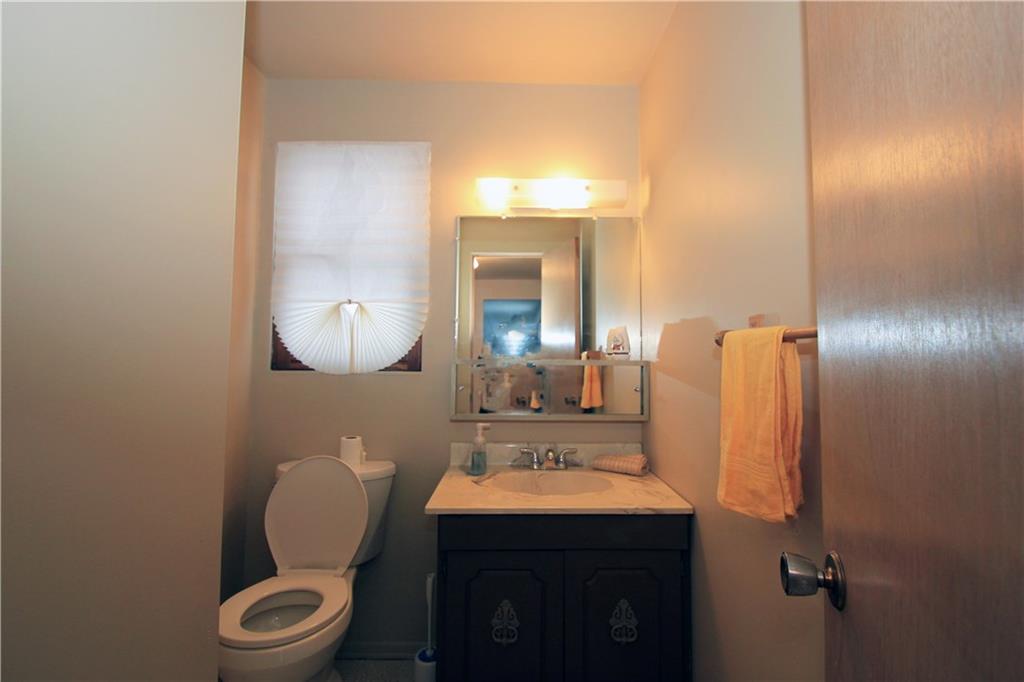 1122 Hamil Road Penn Hills, PA 15147 - Photo 9 of 24 Powder Room - the first floor powder room has a new toilet and is freshly painted.