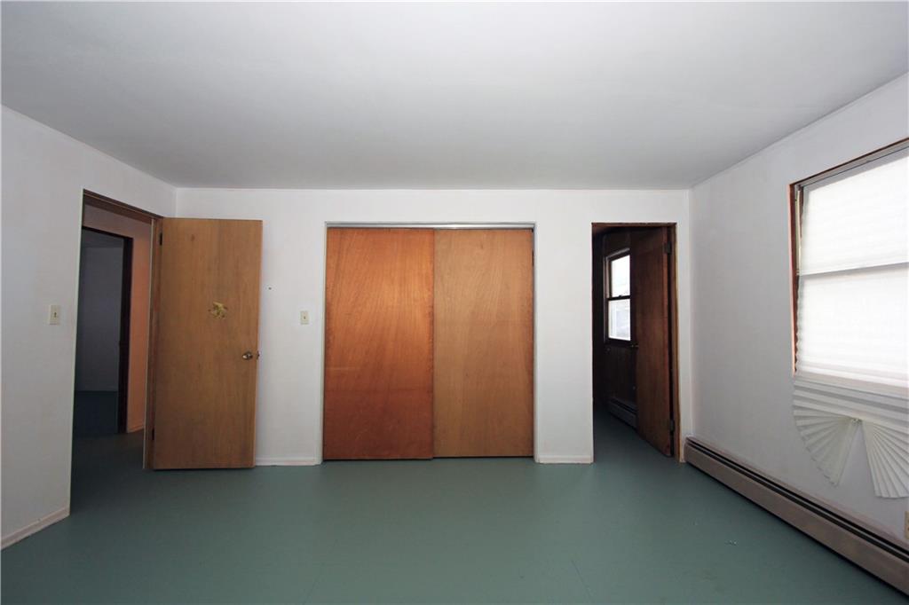 1122 Hamil Road Penn Hills, PA 15147 - Photo 10 of 24 Master Bedroom - The large master bedroom has a spacious closet and there is a master bath that is plumbed but was never finished.