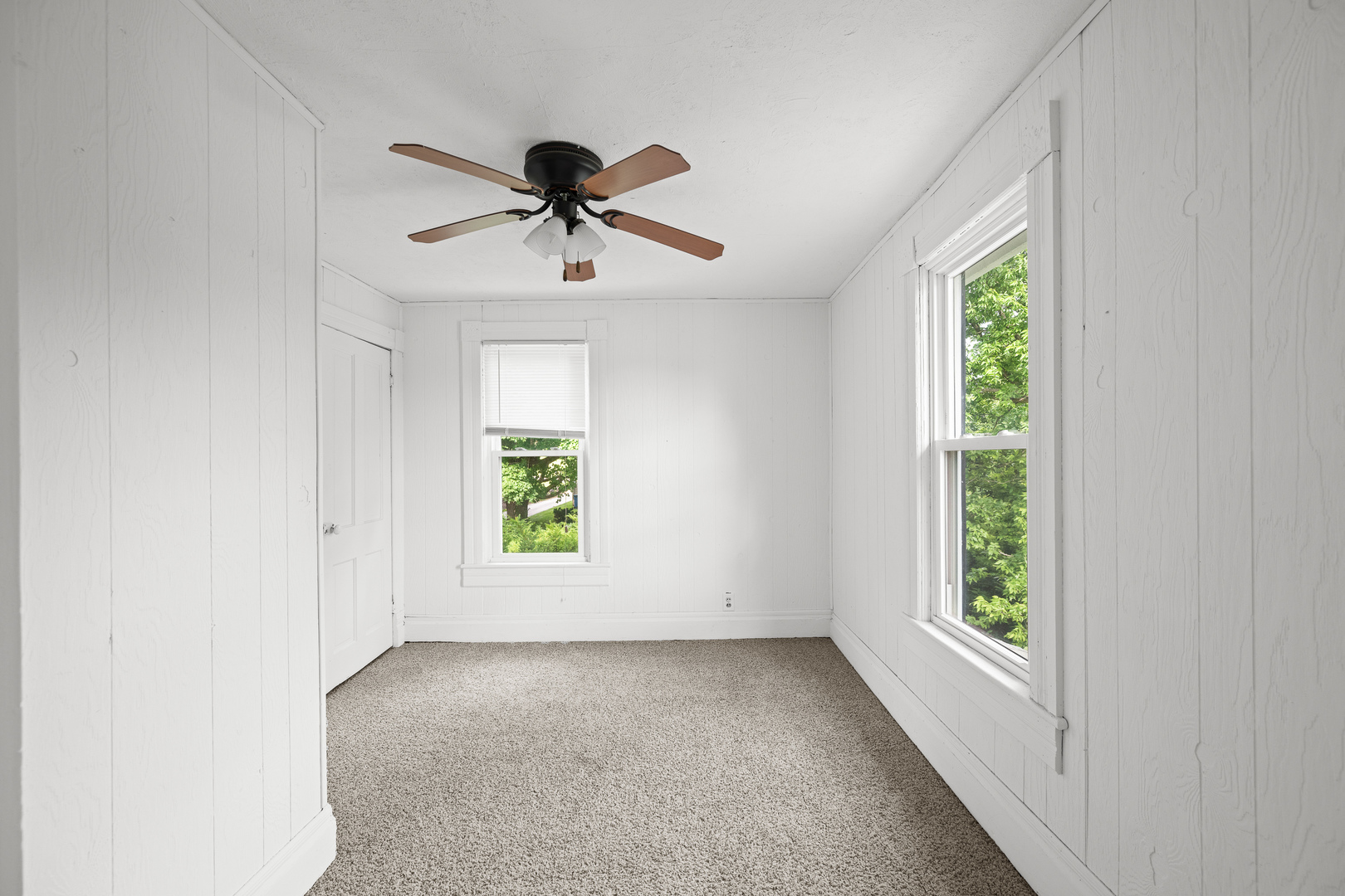 802 North High Street Port Byron, IL 61275 - Photo 33 of 43 a view of room with a ceiling fan and window