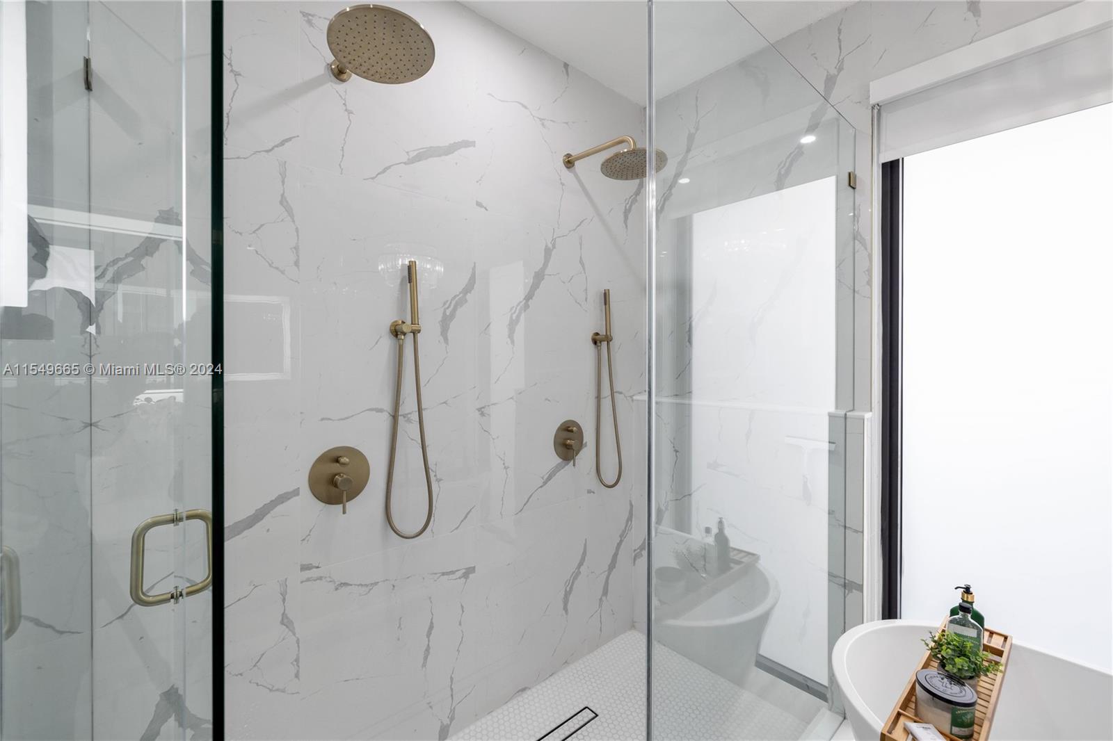 1543 Bird Road Coral Gables, FL 33146 - Photo 32 of 65 a bathroom with a shower