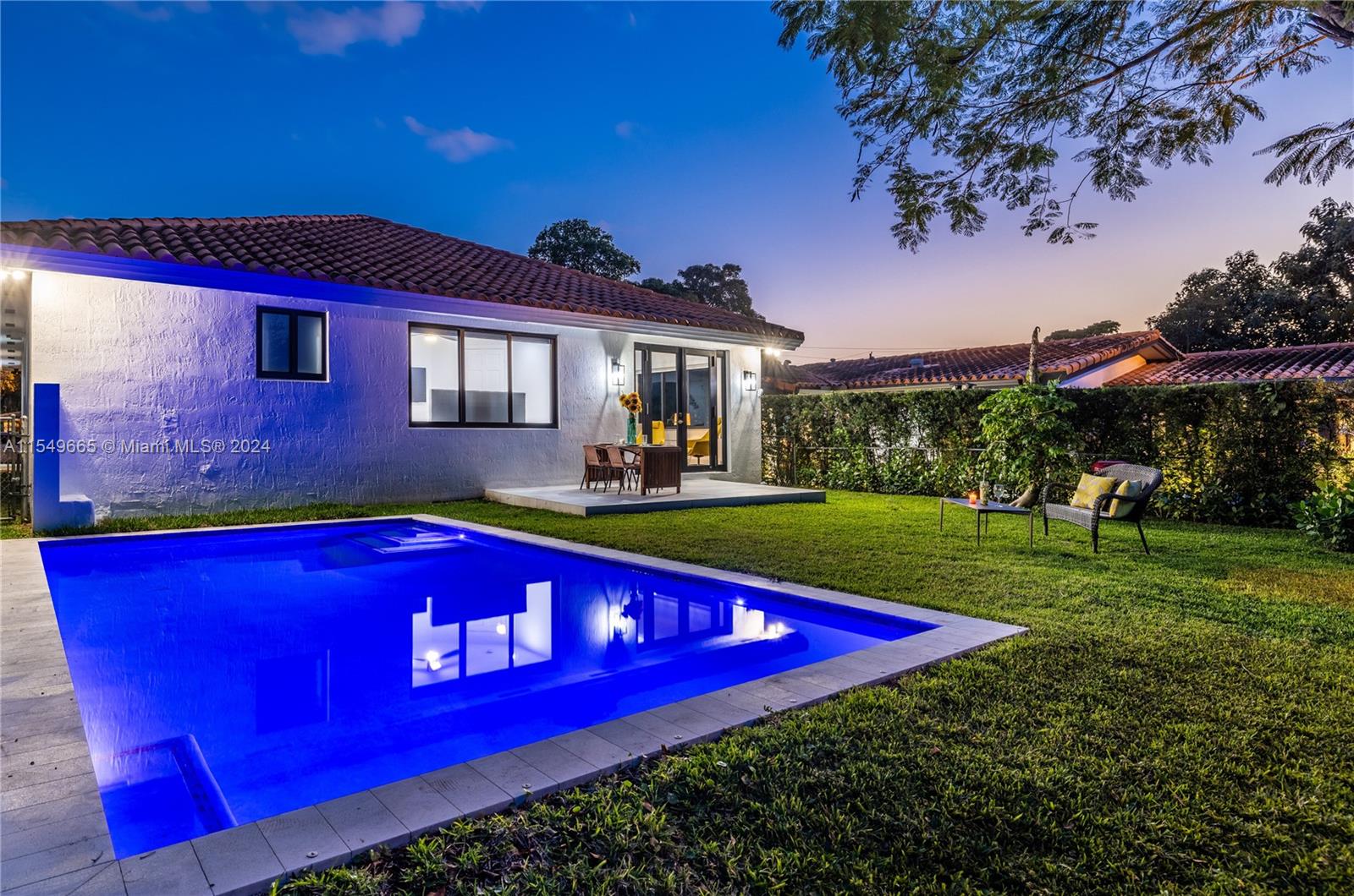 1543 Bird Road Coral Gables, FL 33146 - Photo 4 of 65 a view of a house with a yard