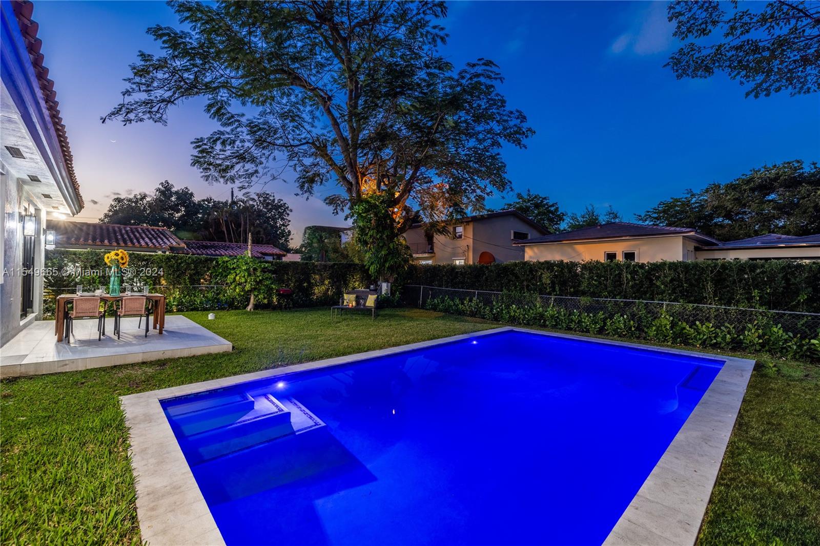 1543 Bird Road Coral Gables, FL 33146 - Photo 5 of 65 a view of an outdoor space pool patio and outdoor seating