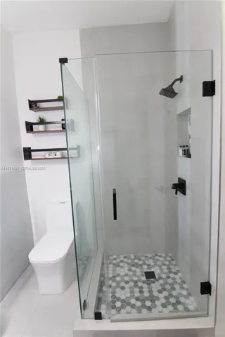 a bathroom with a sink and toilet
