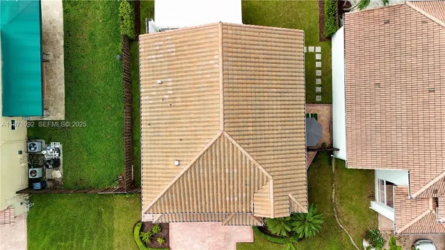 a view of a balcony and a potted plant
