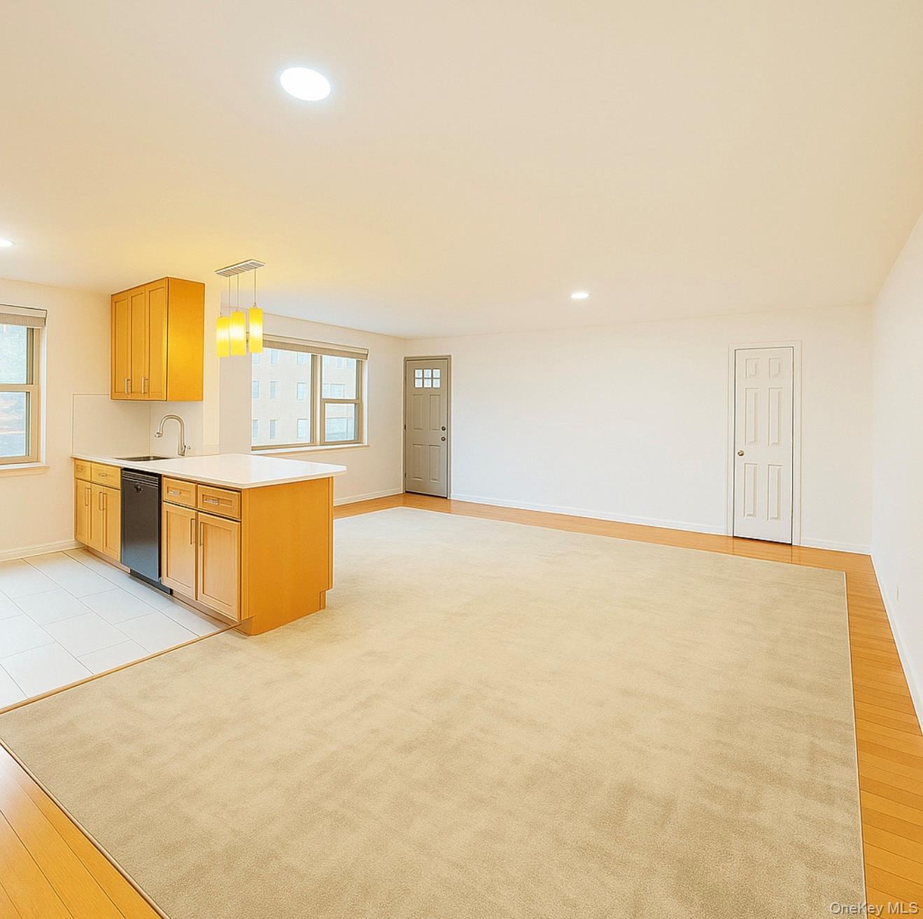 152-44 Jewel Avenue, Unit 102A Queens, NY 11367 - Photo 11 of 12 a view of kitchen and wooden floor