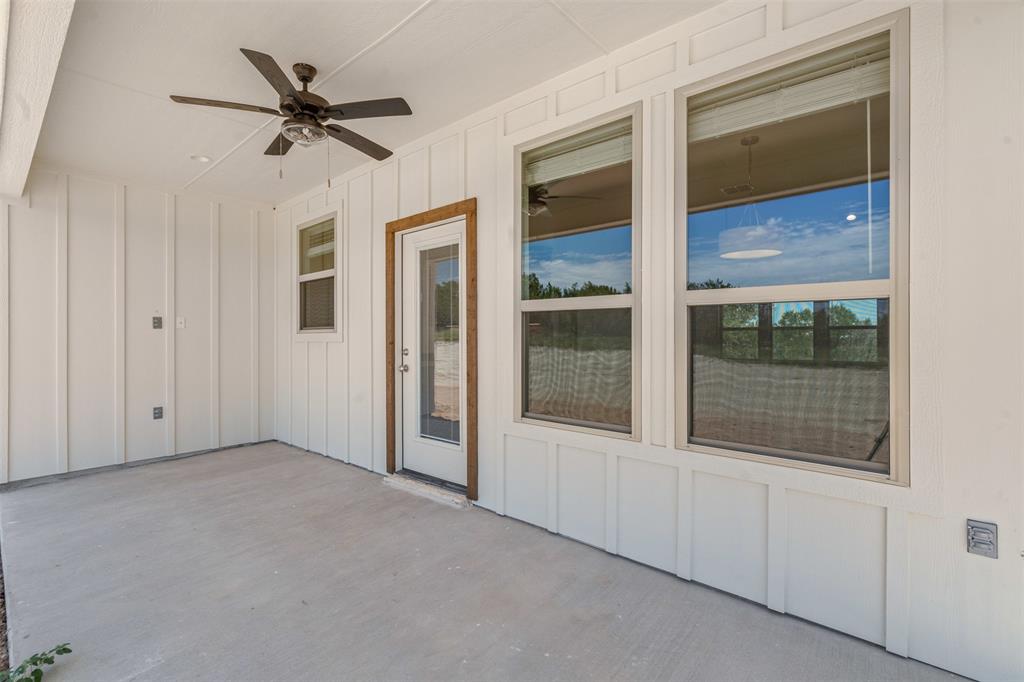 5470 Compass Way Bluff Dale, TX 76433 - Photo 20 of 26 a view of an empty room with a window