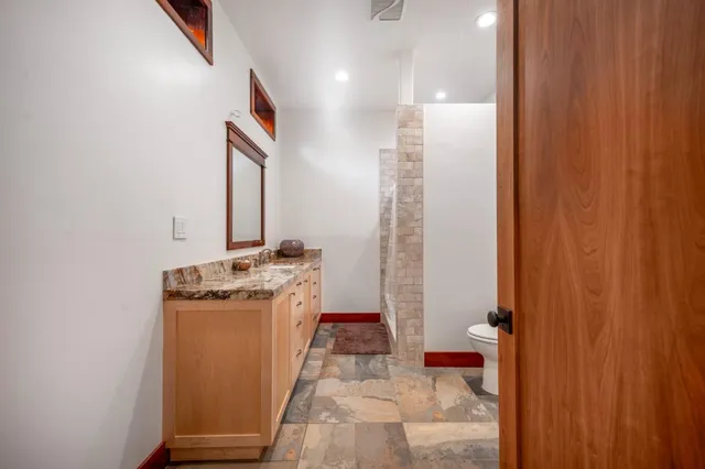 a view of a hallway with washer and dryer