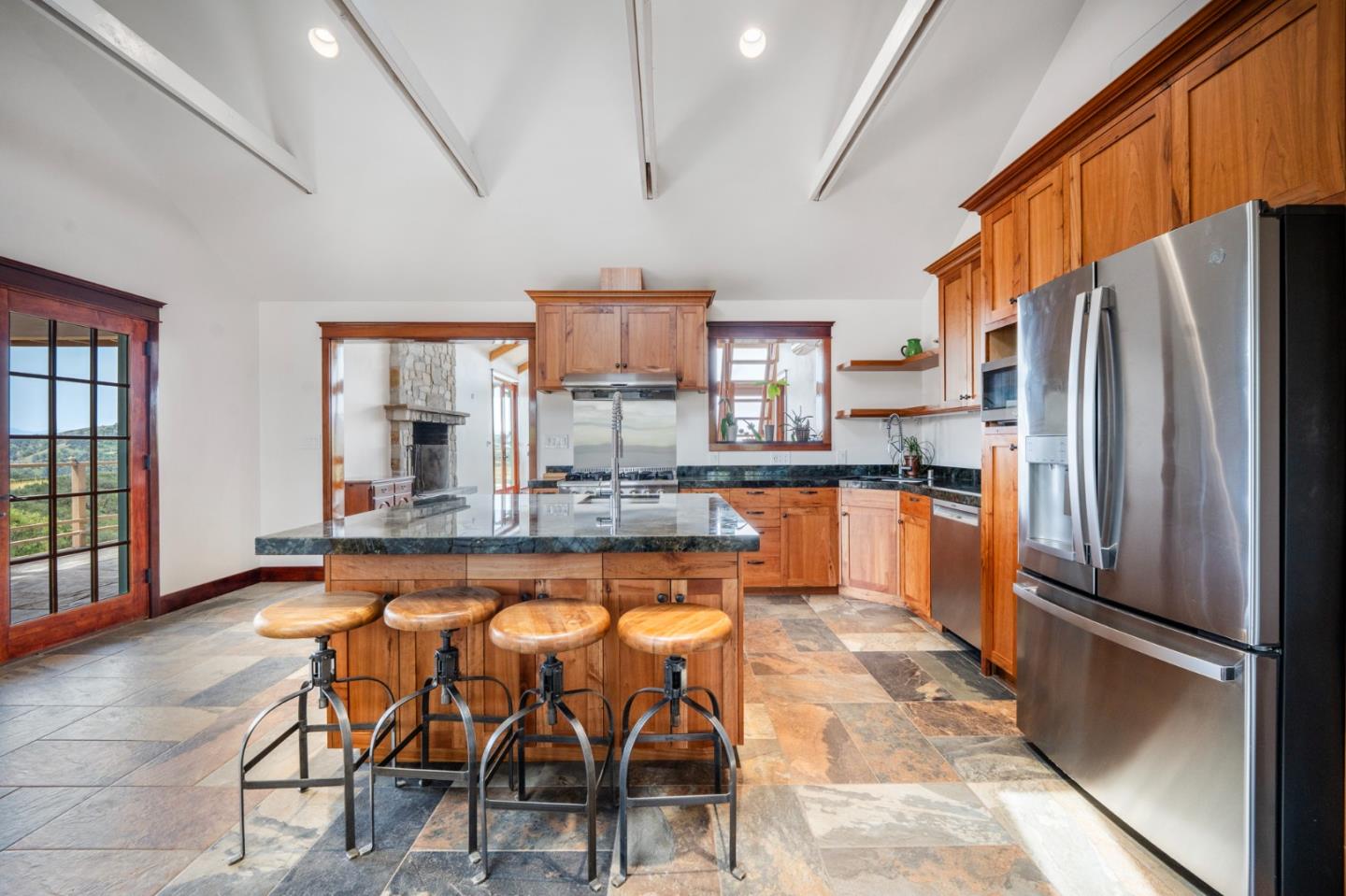 30625 Stonewall Canyon Road Soledad, CA 93960 - Photo 2 of 34 a kitchen with stainless steel appliances granite countertop a refrigerator and a stove top oven