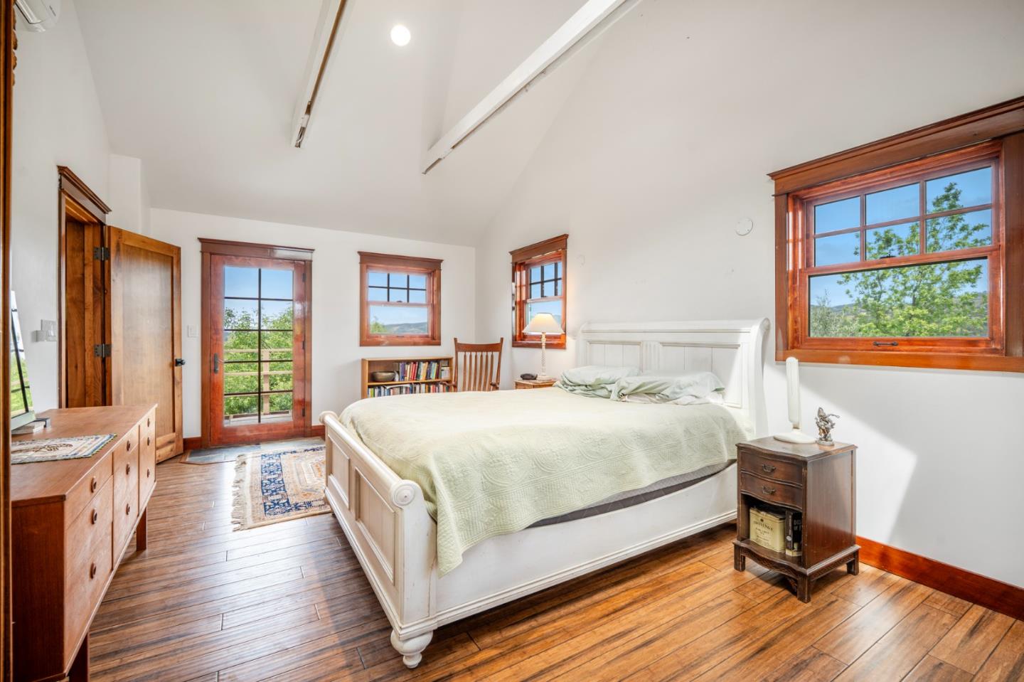 30625 Stonewall Canyon Road Soledad, CA 93960 - Photo 8 of 34 a large bed sitting in a bedroom next to a window