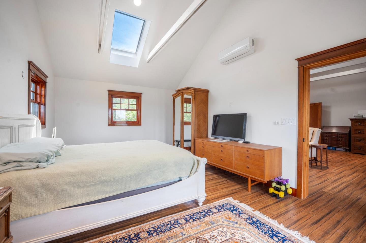 30625 Stonewall Canyon Road Soledad, CA 93960 - Photo 9 of 34 a bedroom with a bed and wooden floor