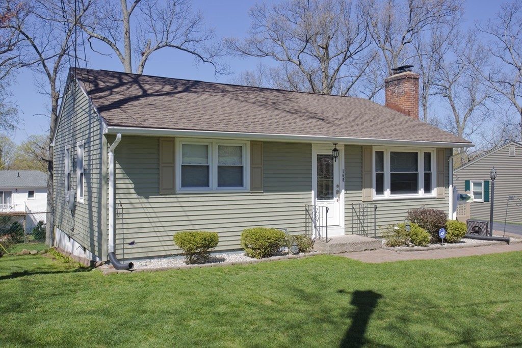 168 West Allen Ridge Road Springfield, MA 01118 - Photo 2 of 24 a front view of a house with a yard