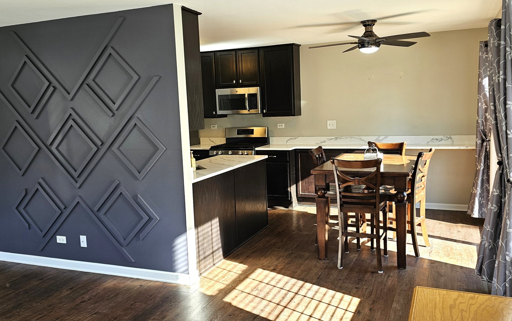 16047 Tiger Drive Lockport, IL 60441 - Photo 10 of 24 a view of a dining room with furniture and wooden floor