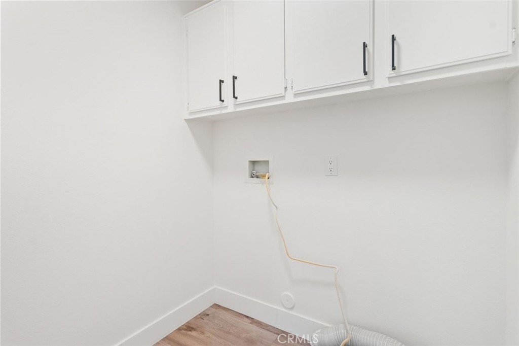 14439 Grandifloras Road Canyon Country, CA 91387 - Photo 28 of 45 a view of small space with racks on the wall