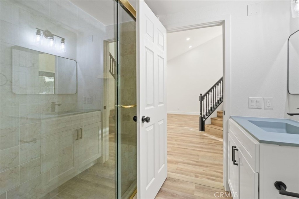 14439 Grandifloras Road Canyon Country, CA 91387 - Photo 29 of 45 a bathroom with a sink and shower