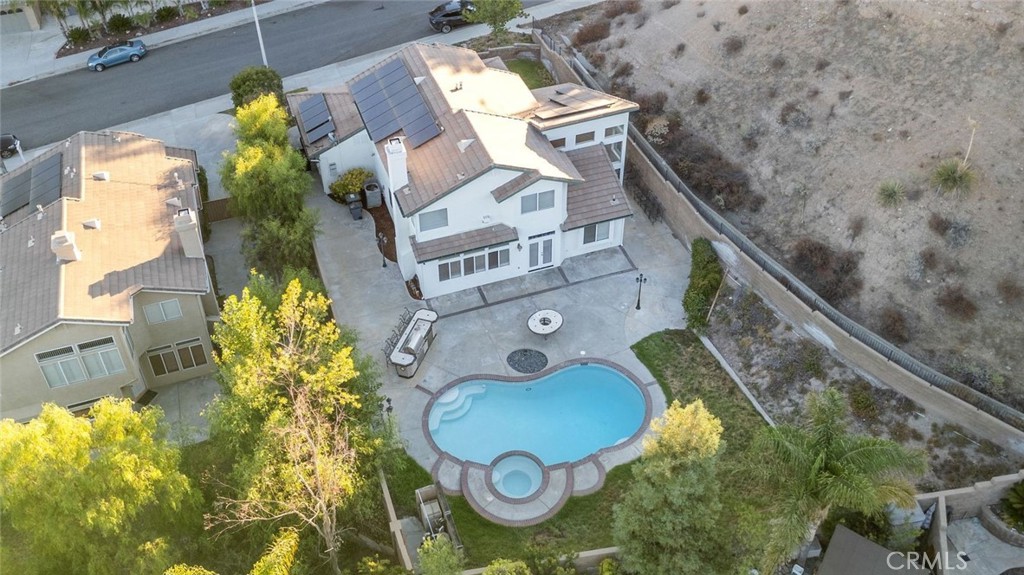 14439 Grandifloras Road Canyon Country, CA 91387 - Photo 4 of 45 a aerial view of a house with a swimming pool