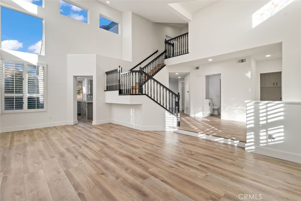 14439 Grandifloras Road Canyon Country, CA 91387 - Photo 6 of 45 a view of entryway and hall with wooden floor