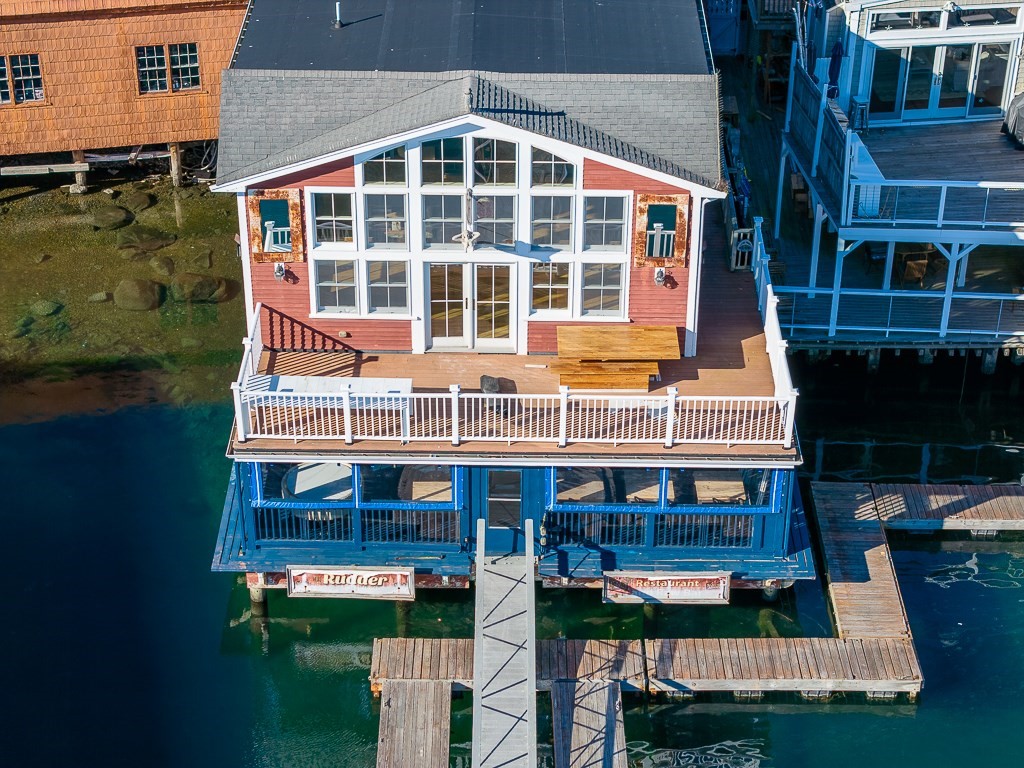 73 Rocky Neck Avenue, Unit 2 Gloucester, MA 01930 - Photo 18 of 22 a front view of a building with balcony