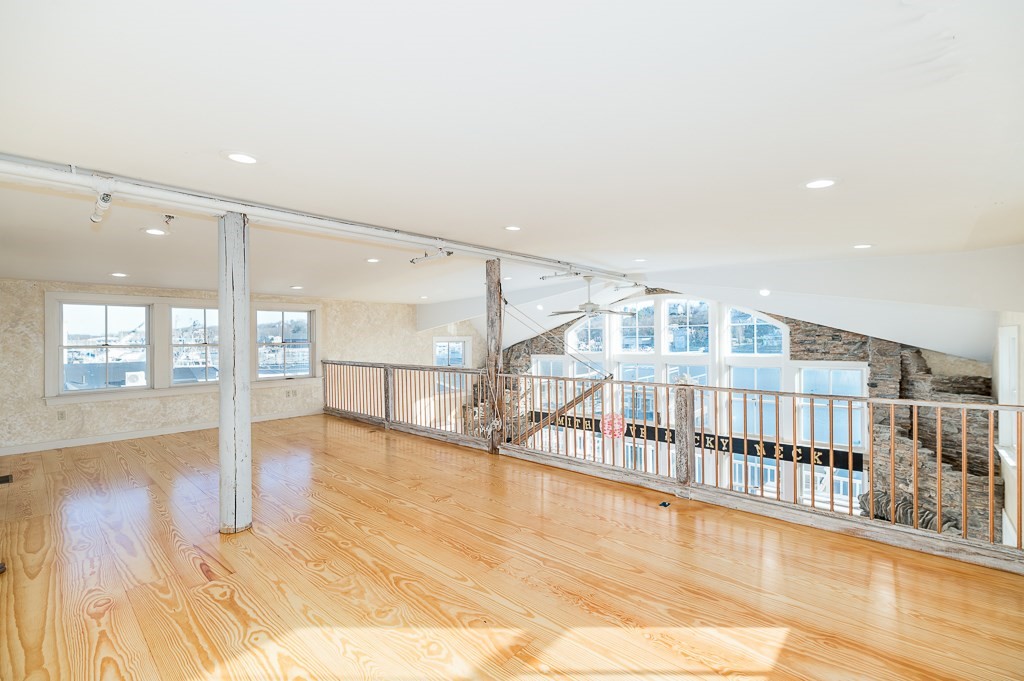 73 Rocky Neck Avenue, Unit 2 Gloucester, MA 01930 - Photo 5 of 22 a view of an entryway with wooden floor