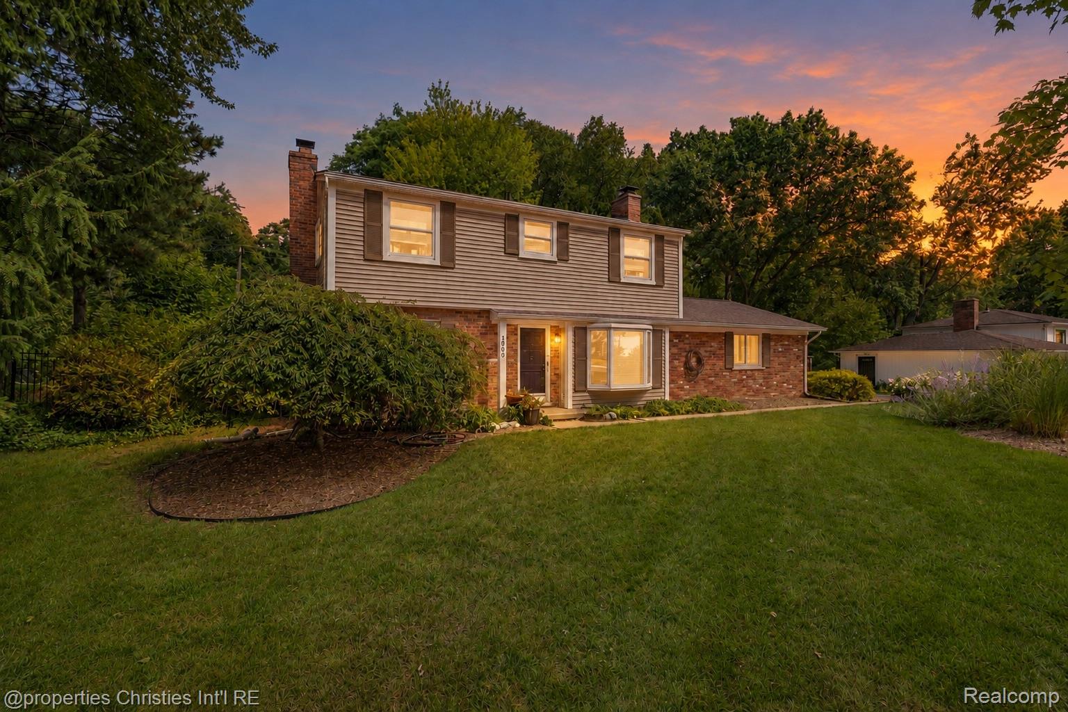 3560 Beach Road Troy, MI 48084 - Photo 1 of 40 Warm Twilight Suburban Home Exterior.jpeg