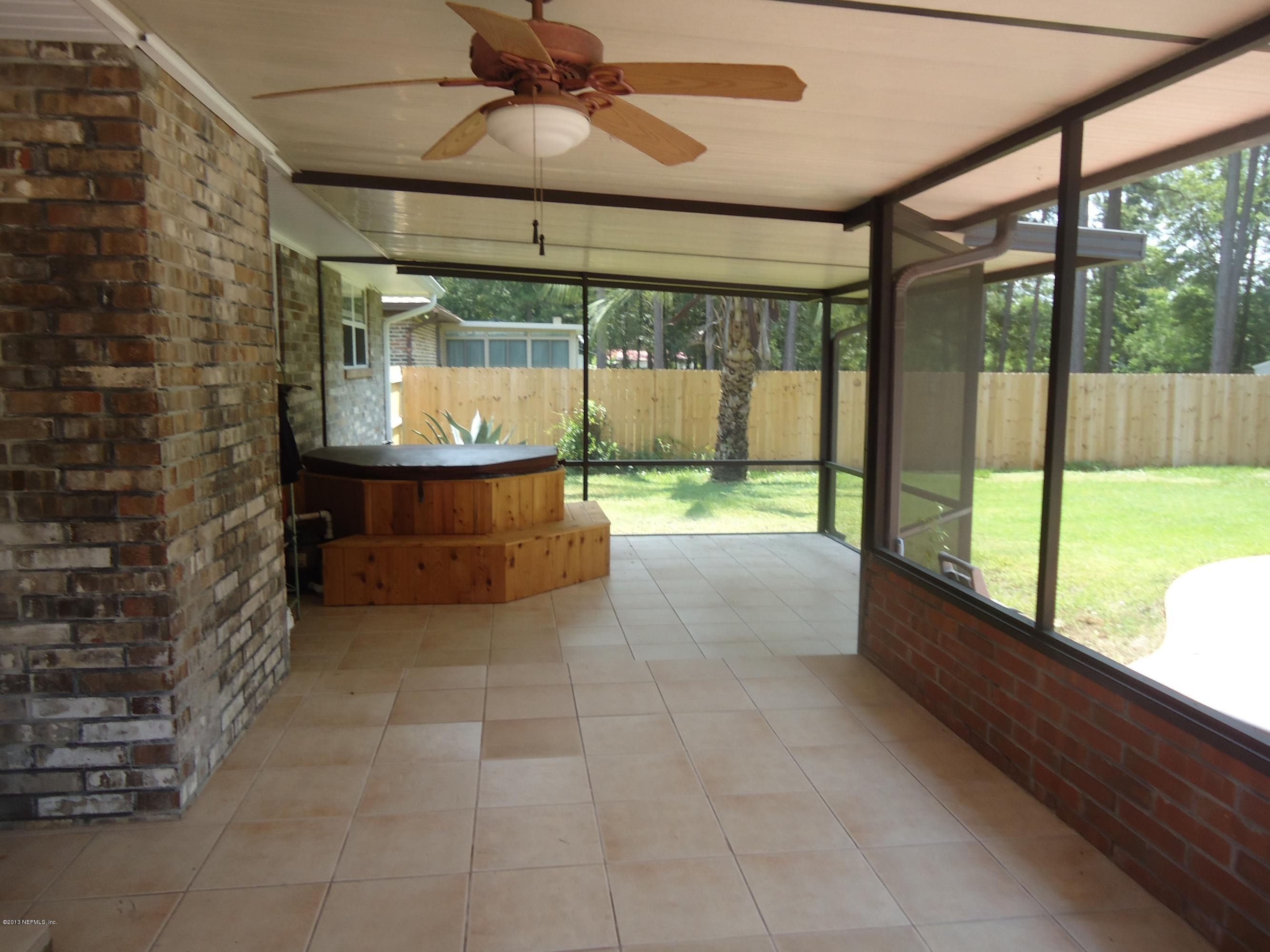 408 Raggedy Point Court Fleming Island, FL 32003 - Photo 3 of 14 Screened Lanai and Hot Tub