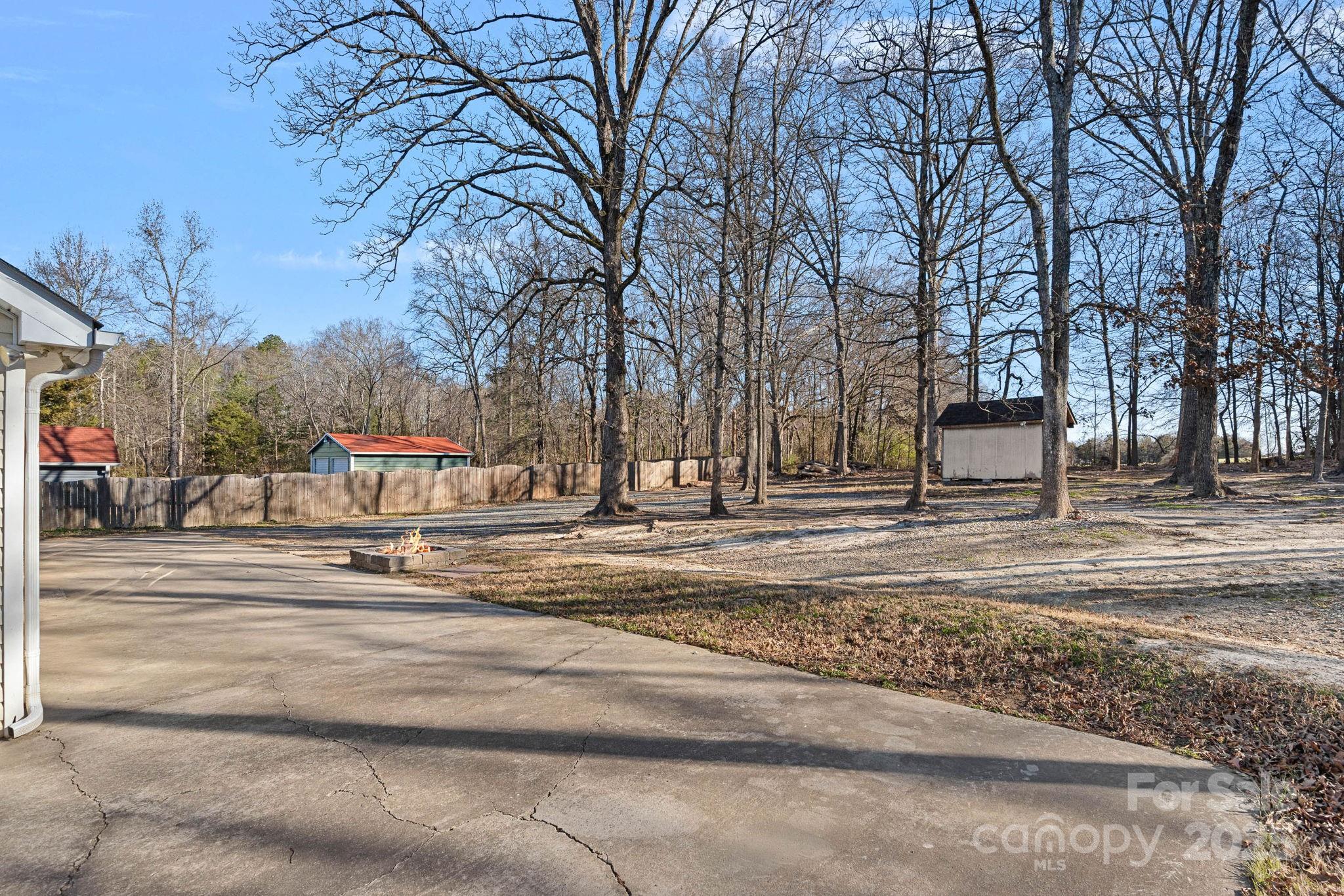 7100 Windsong Way Wingate, NC 28174 - Photo 22 of 26 a view of street with houses