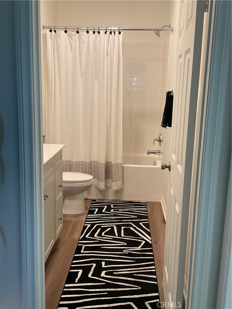 30153 Cyn Rnch Drive Homeland, CA 92548 - Photo 12 of 19 a bathroom with a sink a toilet a mirror and shower