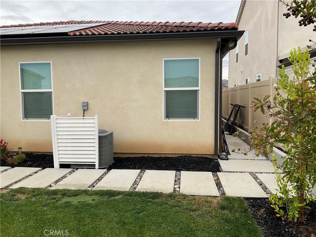 30153 Cyn Rnch Drive Homeland, CA 92548 - Photo 17 of 19 a house view with a backyard