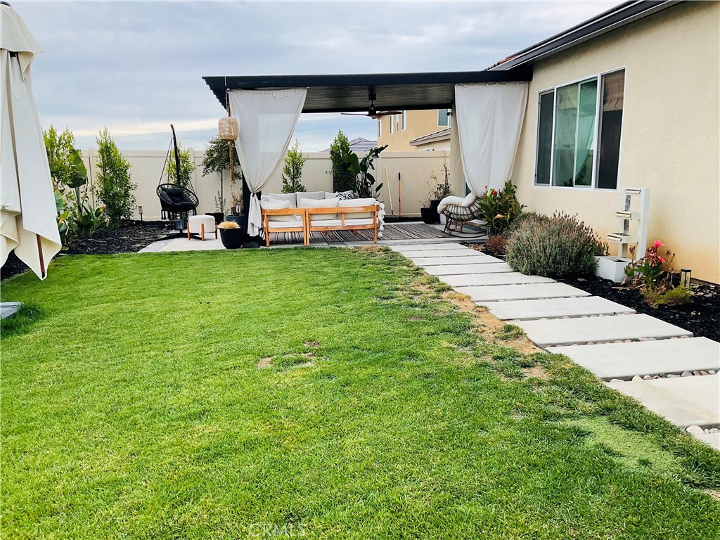 30153 Cyn Rnch Drive Homeland, CA 92548 - Photo 18 of 19 a view of a house with backyard and porch