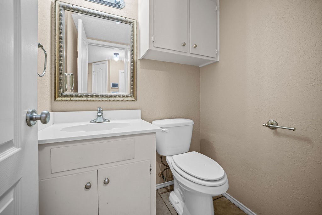7345 Windy Ridge Drive Corpus Christi, TX 78413 - Photo 14 of 28 Downstairs 1/2 Bathroom