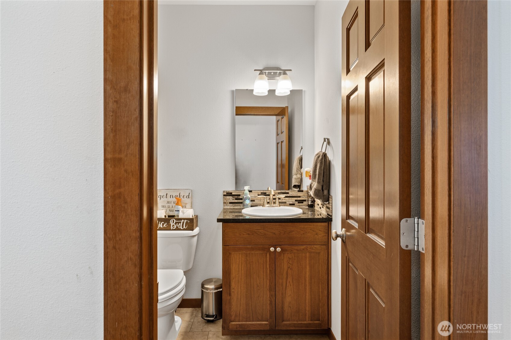 583 Rein Road Ellensburg, WA 98926 - Photo 22 of 40 a bathroom with a sink and a mirror