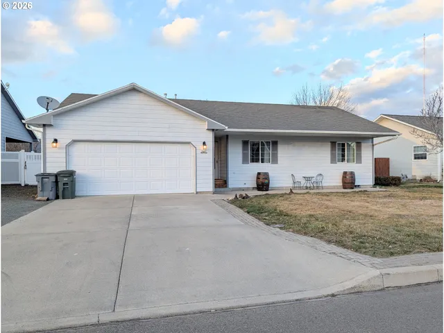 a very nice looking house with a yard