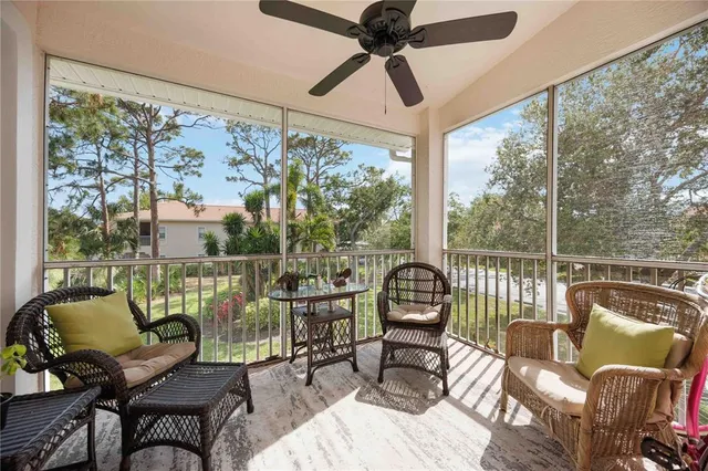 a living room with large windows